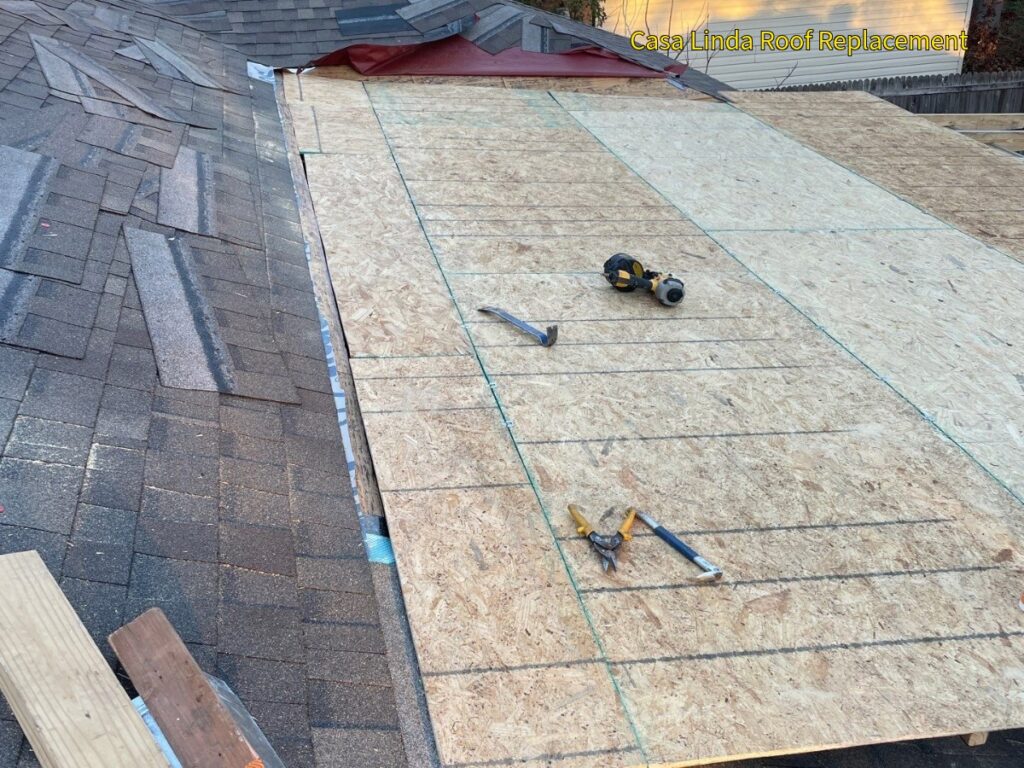 Low-pitched roof addition in progress on Springhill in Casa Linda