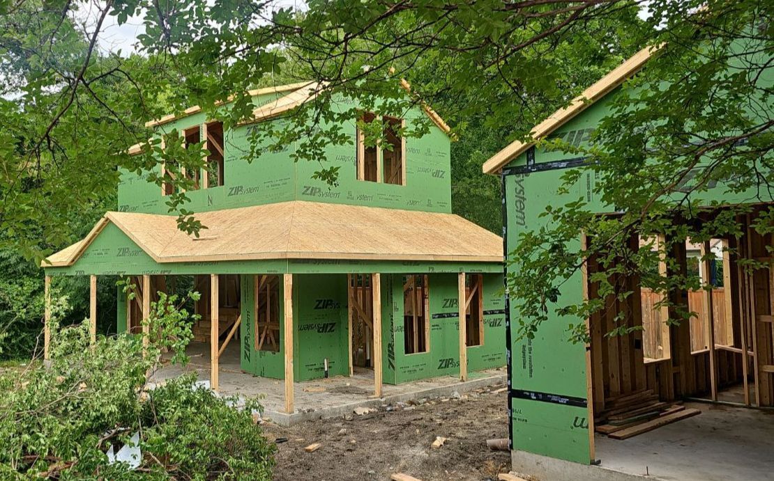 Early framing and roof construction on a major home renovation in Casa Linda Estates, Dallas 75218.