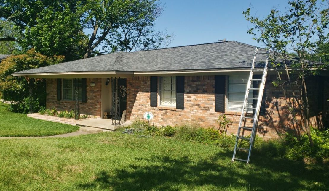A storm-related roof replacement on Queenswood Lane in Lake Highlands revealed excessive deflection in the original 3/8-inch roof decking. After documenting the problem, the old deck was replaced with new 5/8-inch plywood before installation of an Owens Corning Duration roof.