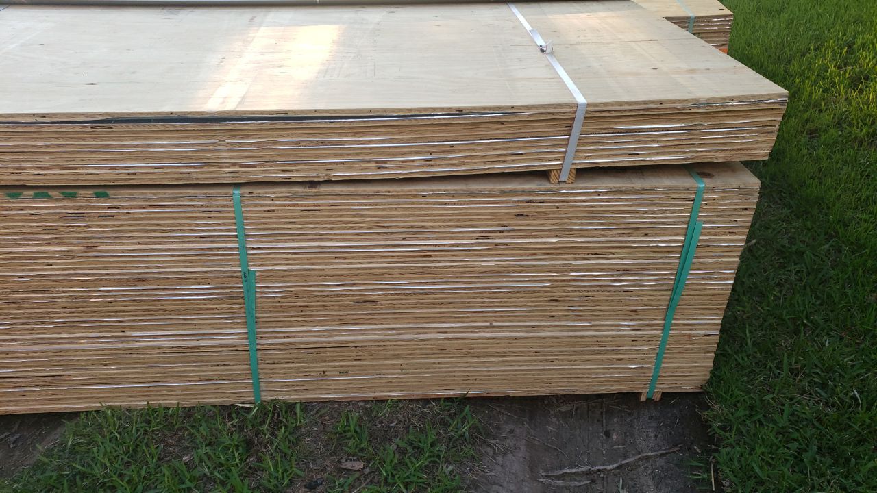 New 5/8-inch plywood roof decking delivered for a Lake Highlands roof replacement in Dallas 75238
