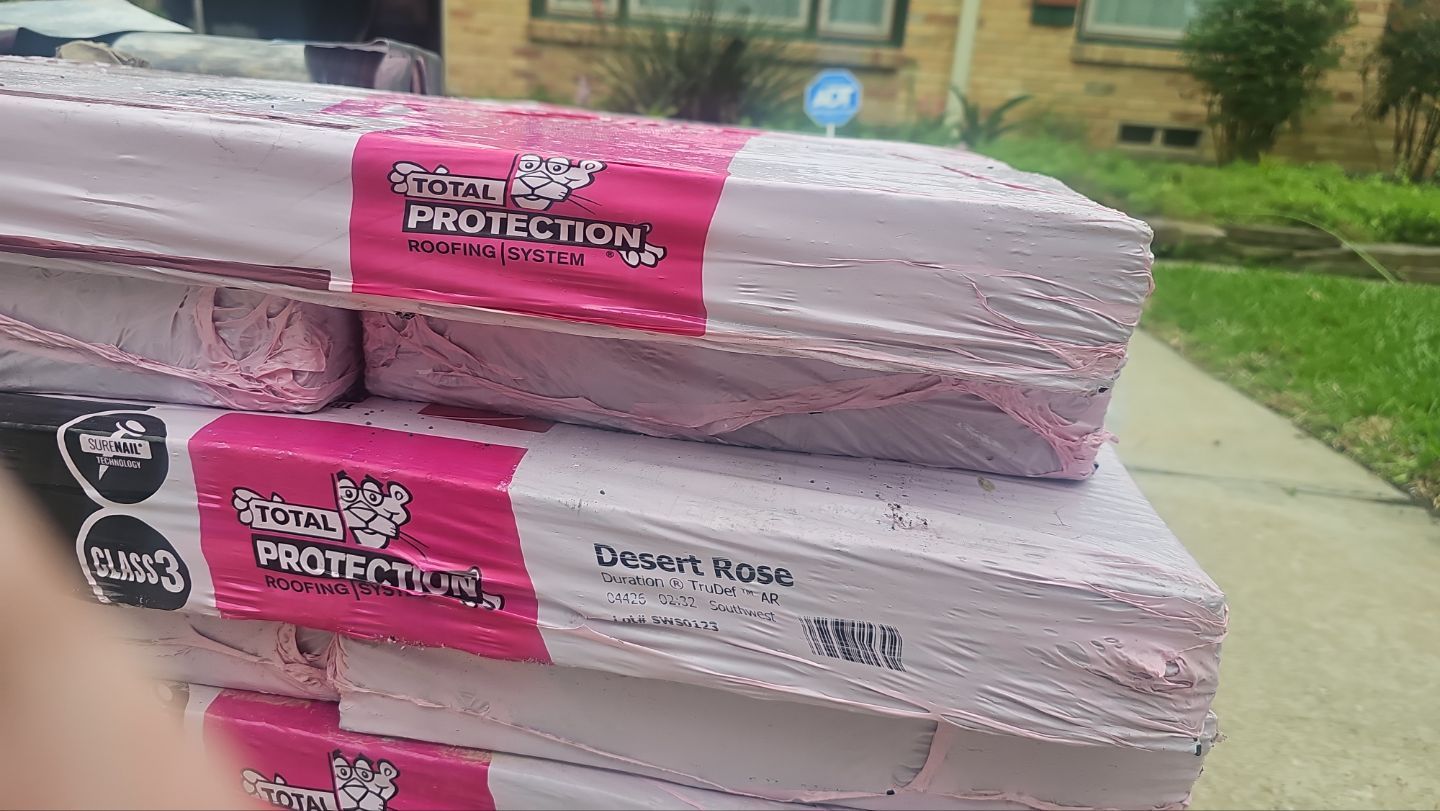 Owens Corning Duration Desert Rose shingle bundles delivered for an Old Lake Highlands roof replacement