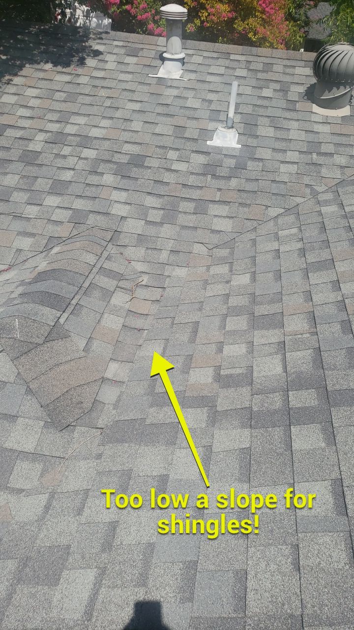 Small low-slope roof section in Lakewood where asphalt shingles were not appropriate