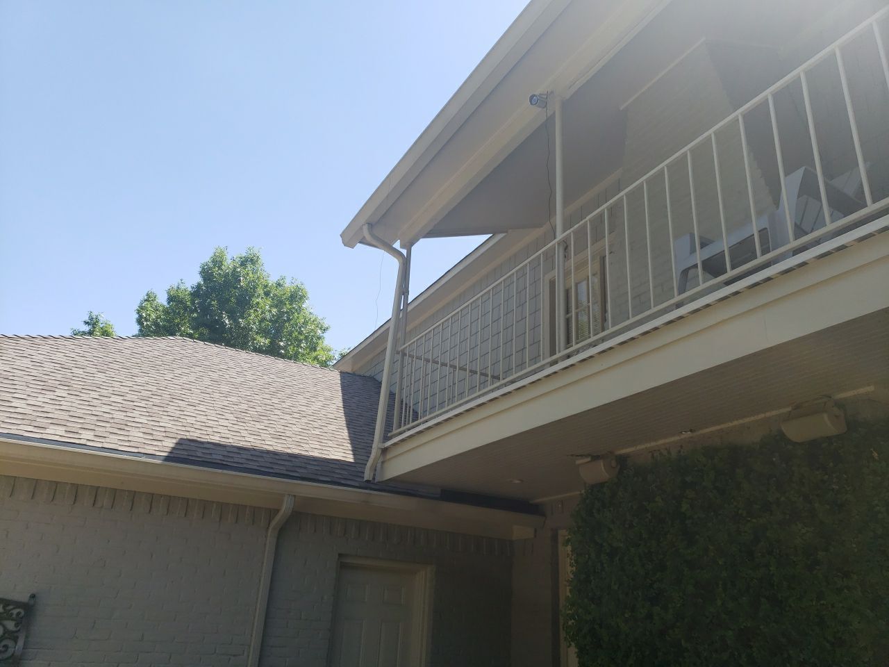 Second-story addition above lower roof in Town Creek, Lake Highlands 75243