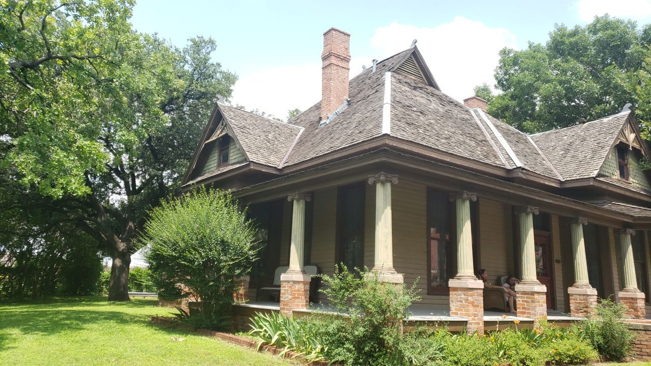Historic Sullivan House at Old City Park in Dallas before its cedar roof restoration by Bert Roofing