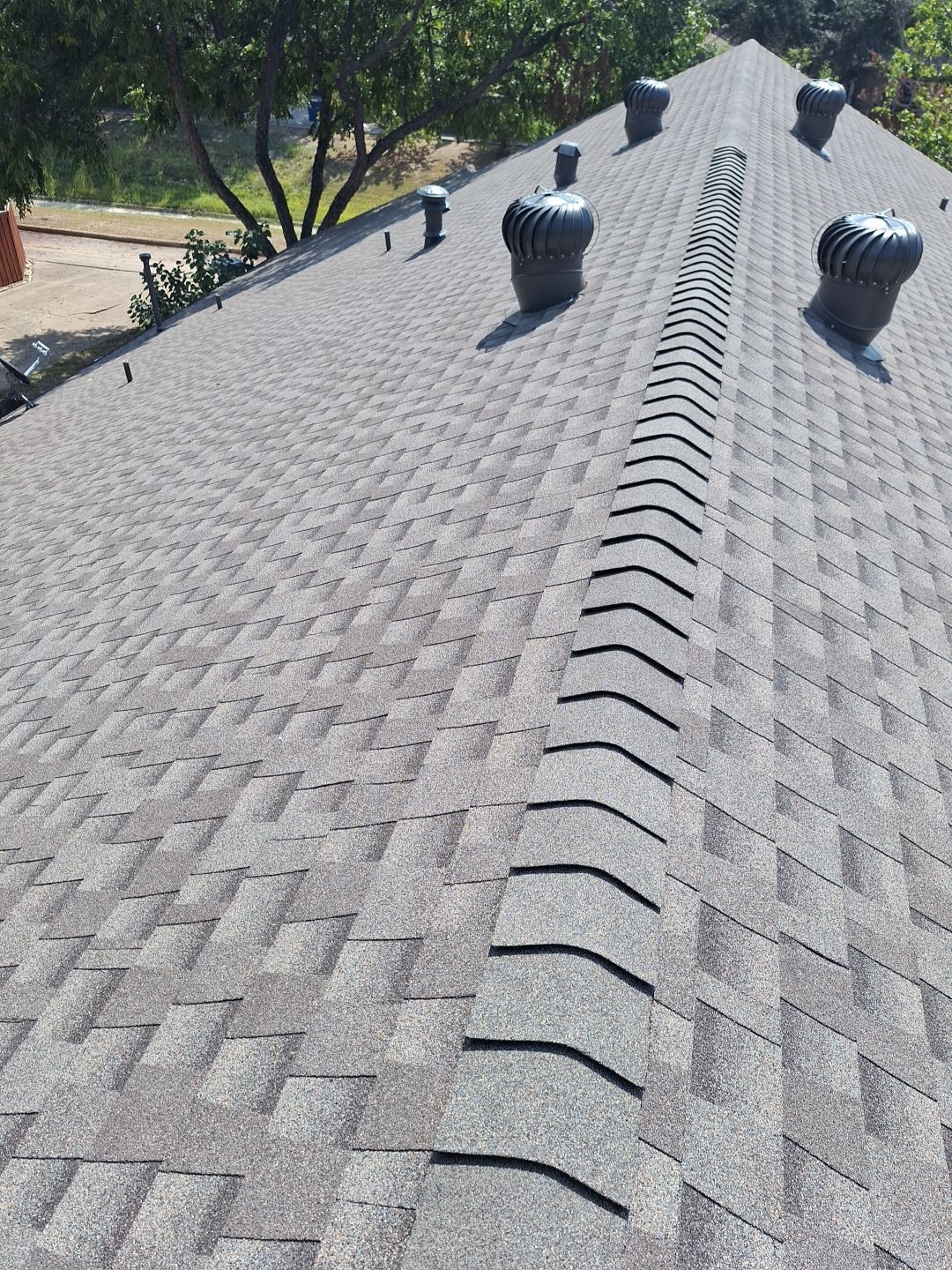 GAF Timberline HDZ Weathered Wood roof with four turbine vents in North Dallas