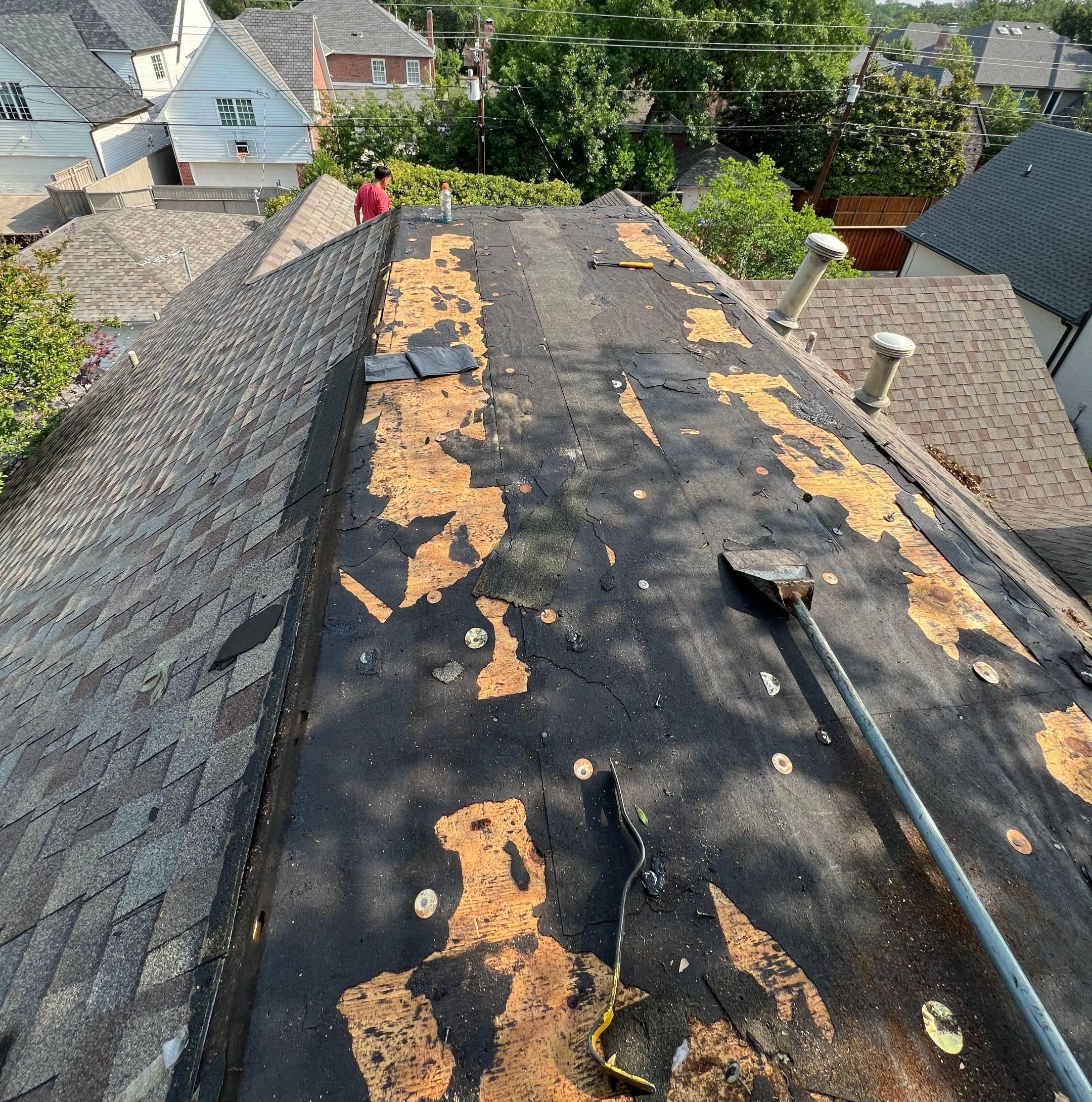 tear off old low slope roofing