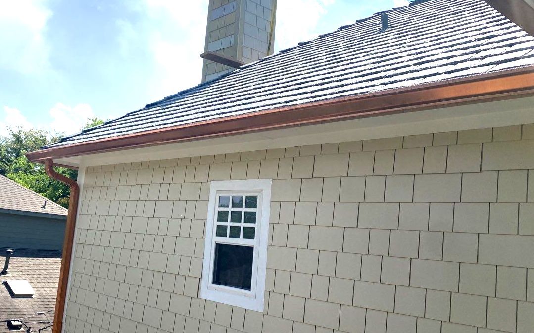 Copper gutters installed with DaVinci Slate roof on North Dallas home