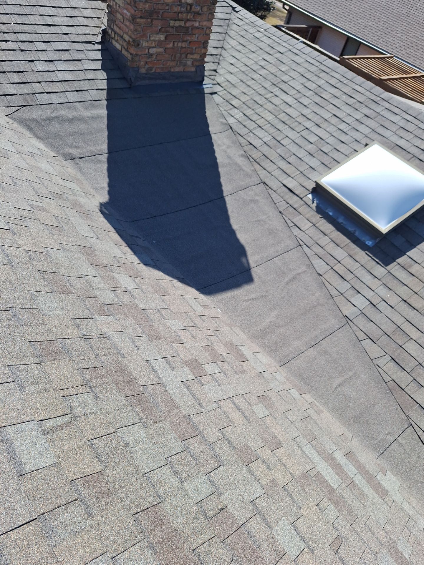 CertainTeed Flintastic modified bitumen on a low-slope roof section in Dallas 75214