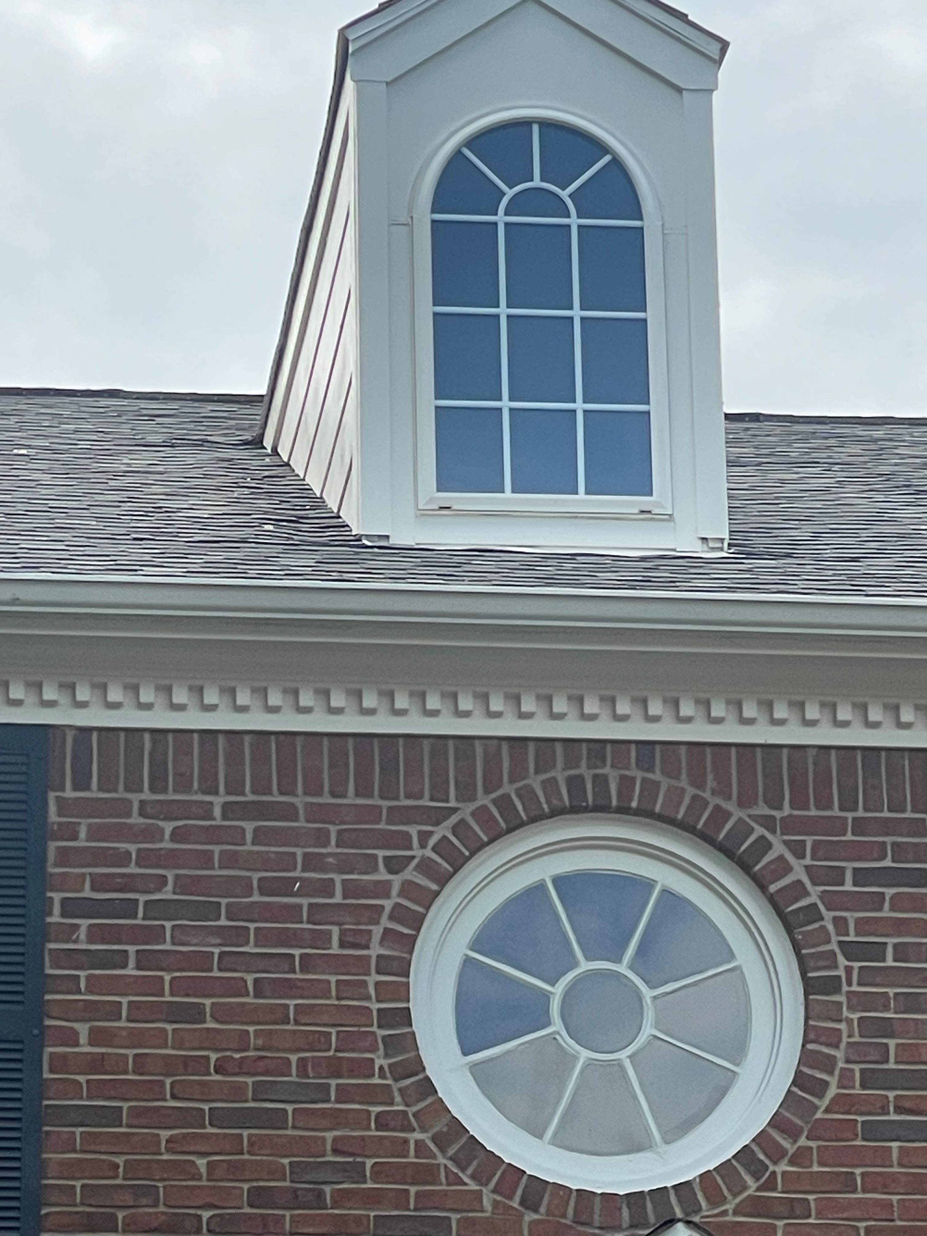 Completed dormer with new Hardie siding and matching TAMKO Heritage Oxford Grey roof shingles on a Highland Park home near SMU.