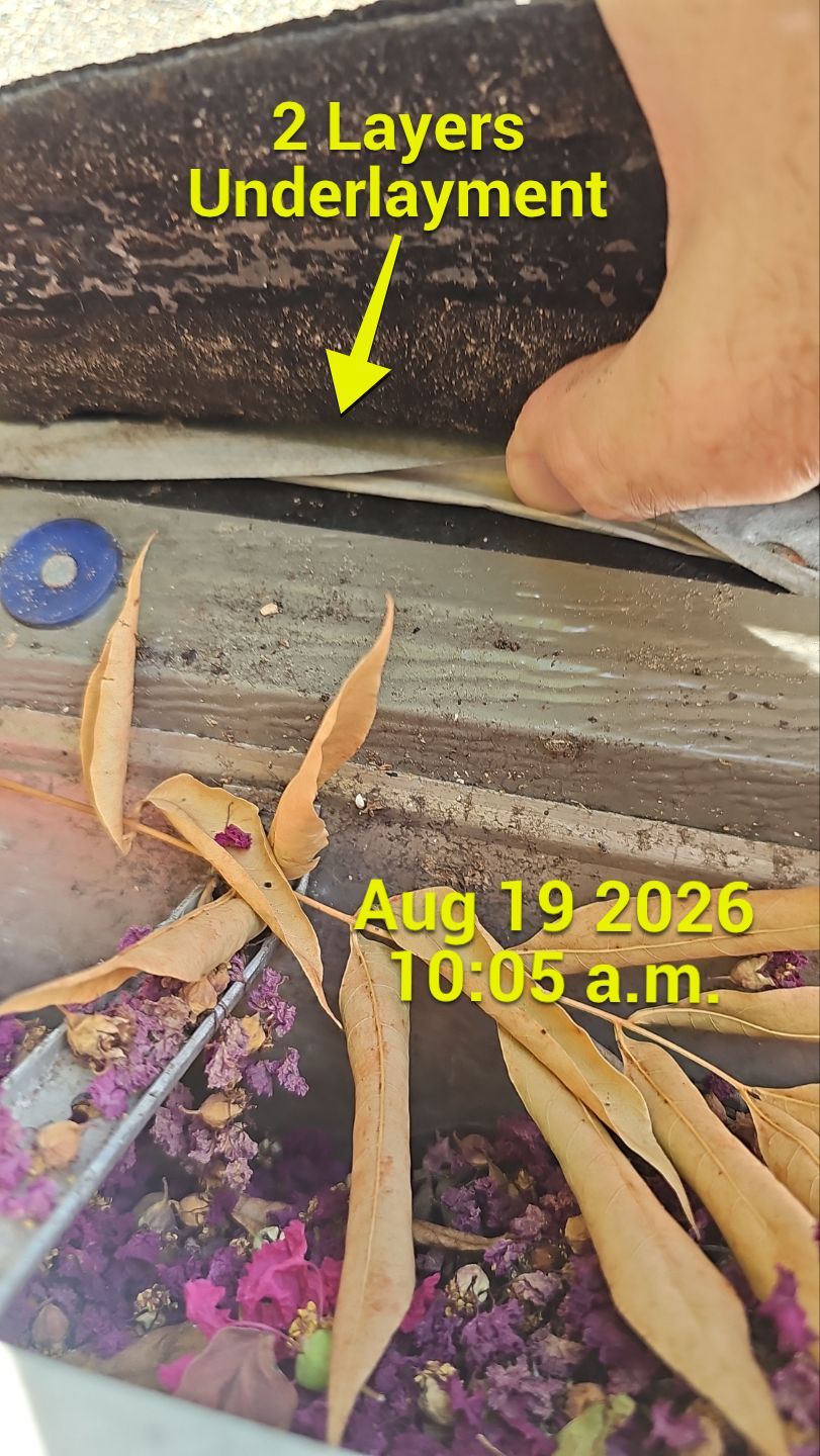 Roof inspection in Firewheel, Garland, showing multiple layers of old roofing underlayment exposed along the roof edge.