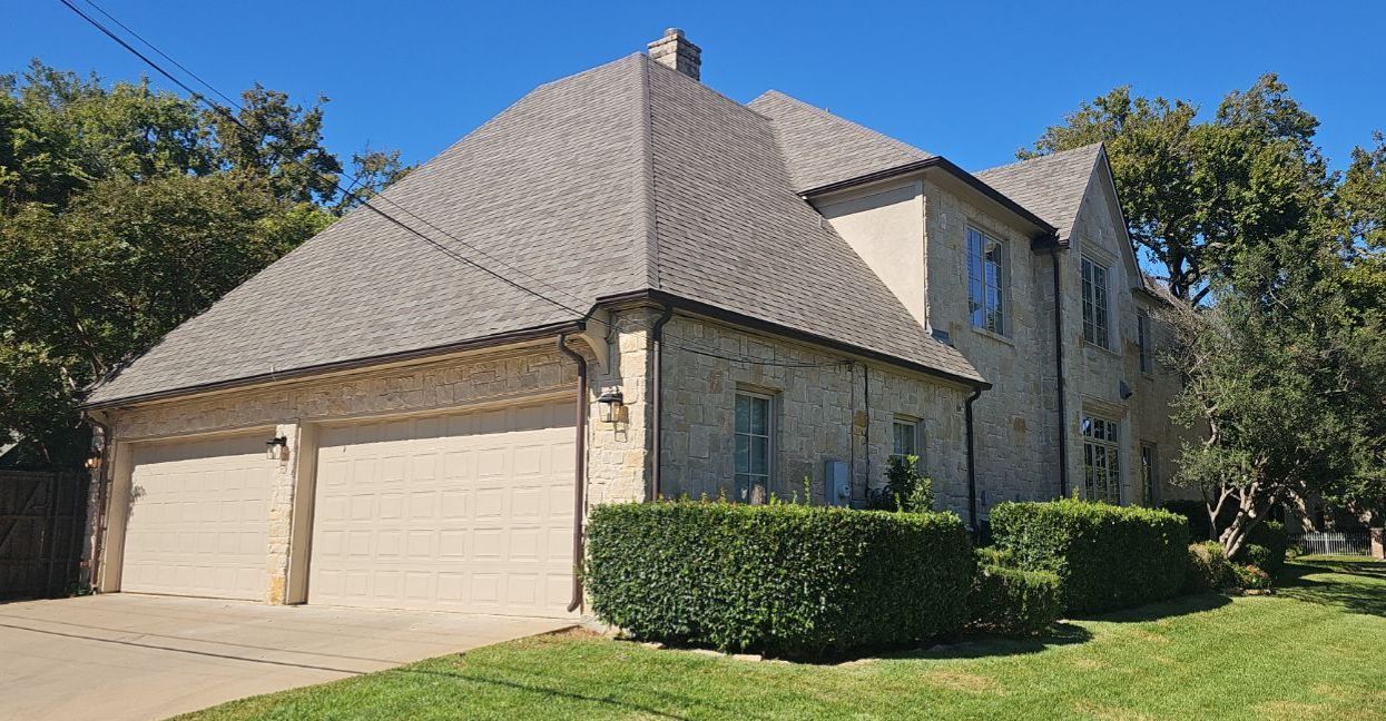 Completed Owens Corning Duration Storm roof in Driftwood on a Preston Hollow Dallas home with original copper gutters reinstalled.