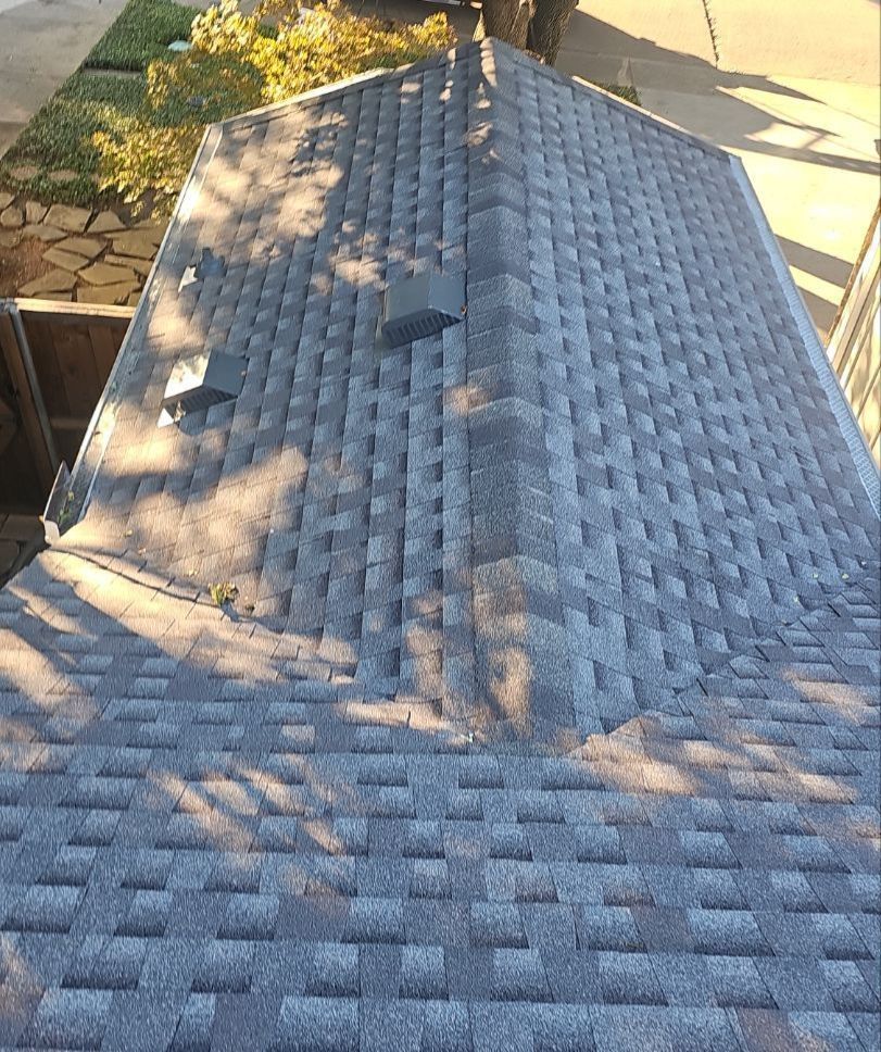 New GAF Timberline ArmorShield II Class 4 roof in Weathered Wood with roof vents on a Rosser Square home in North Dallas.