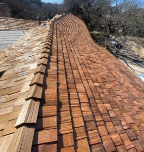 Western Red Cedar shingle roof detail on Charles Dilbeck home restoration in Dallas by Bert Roofing.